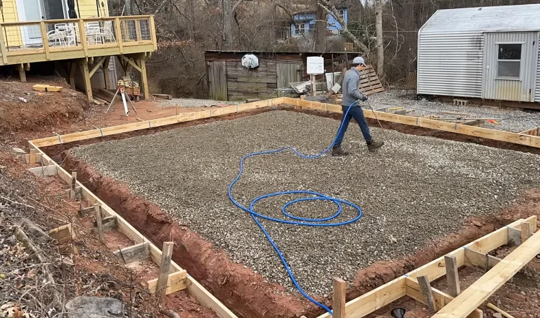 New construction slab and foundation footings before the building envelope is closed